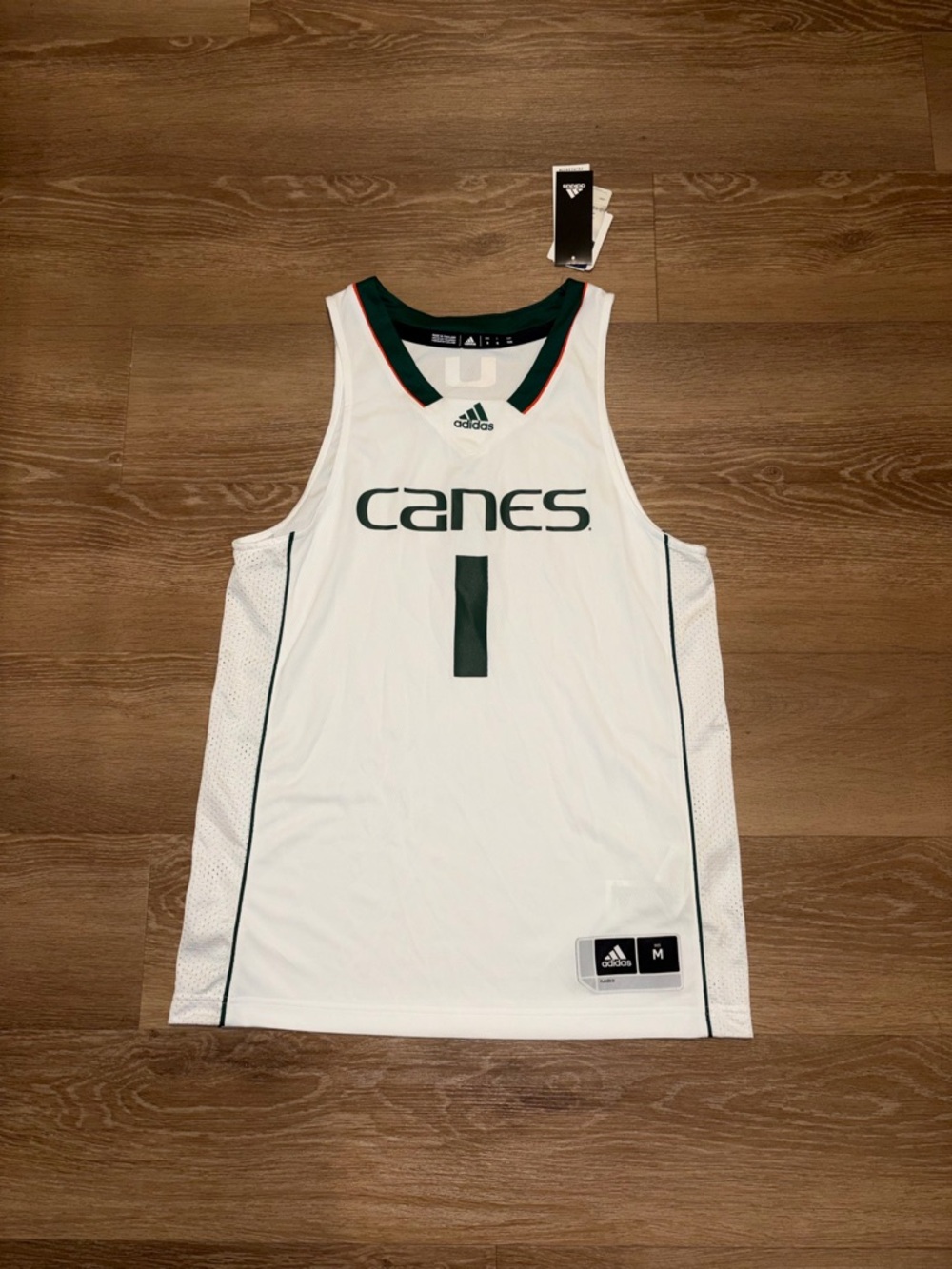 adidas Men’s White Basketball Jersey with Green Trim
